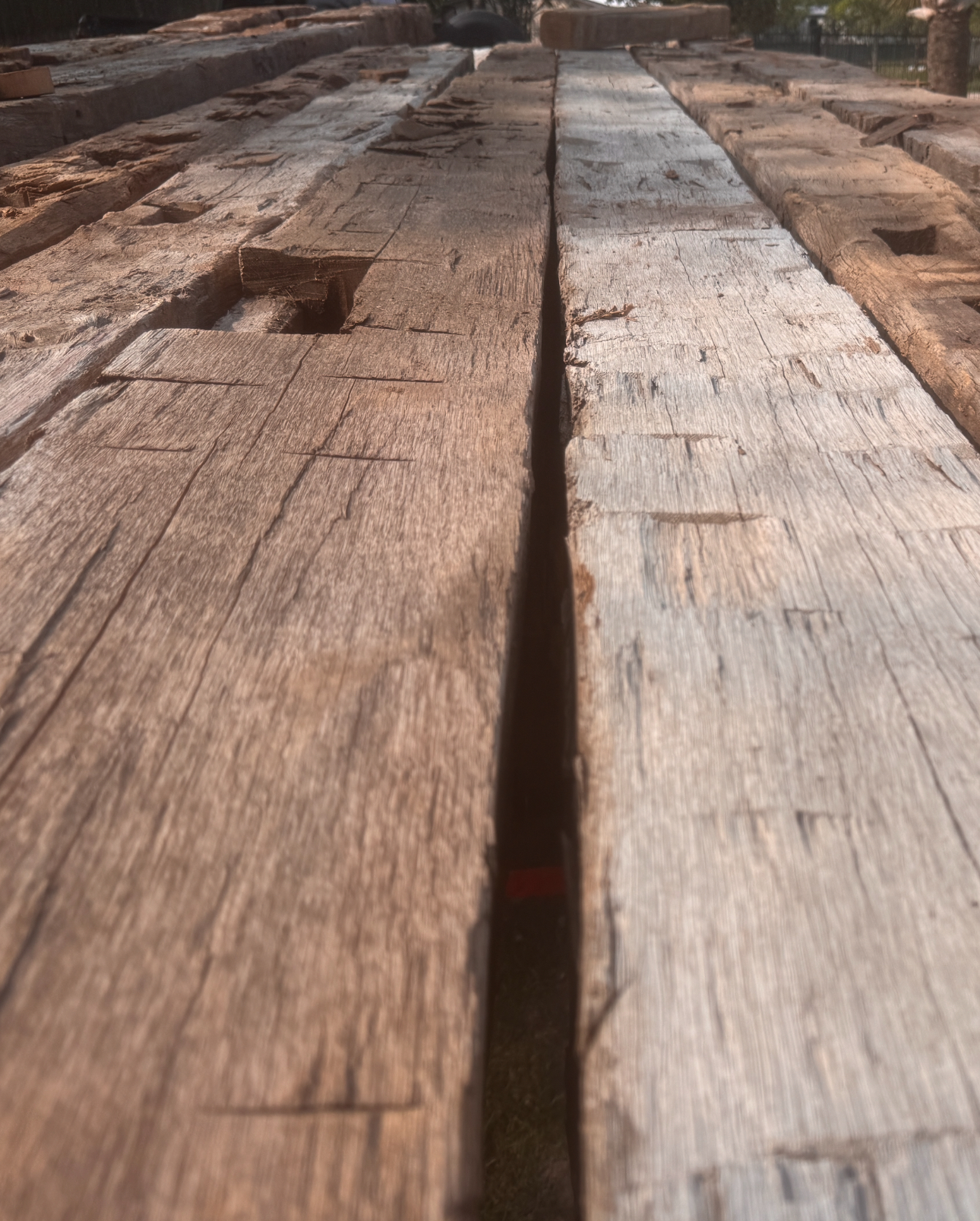 Close-up of hand-hewn barn beams