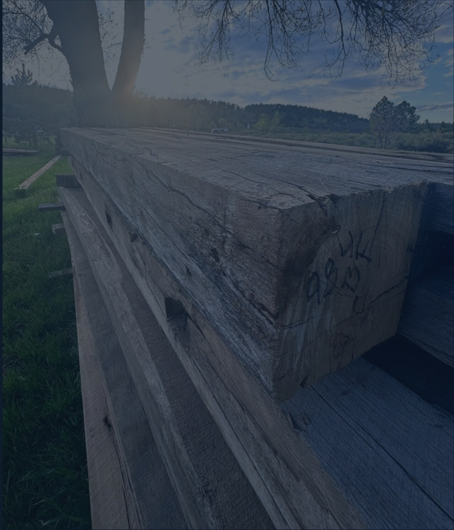 Stacks of reclaimed barn lumber